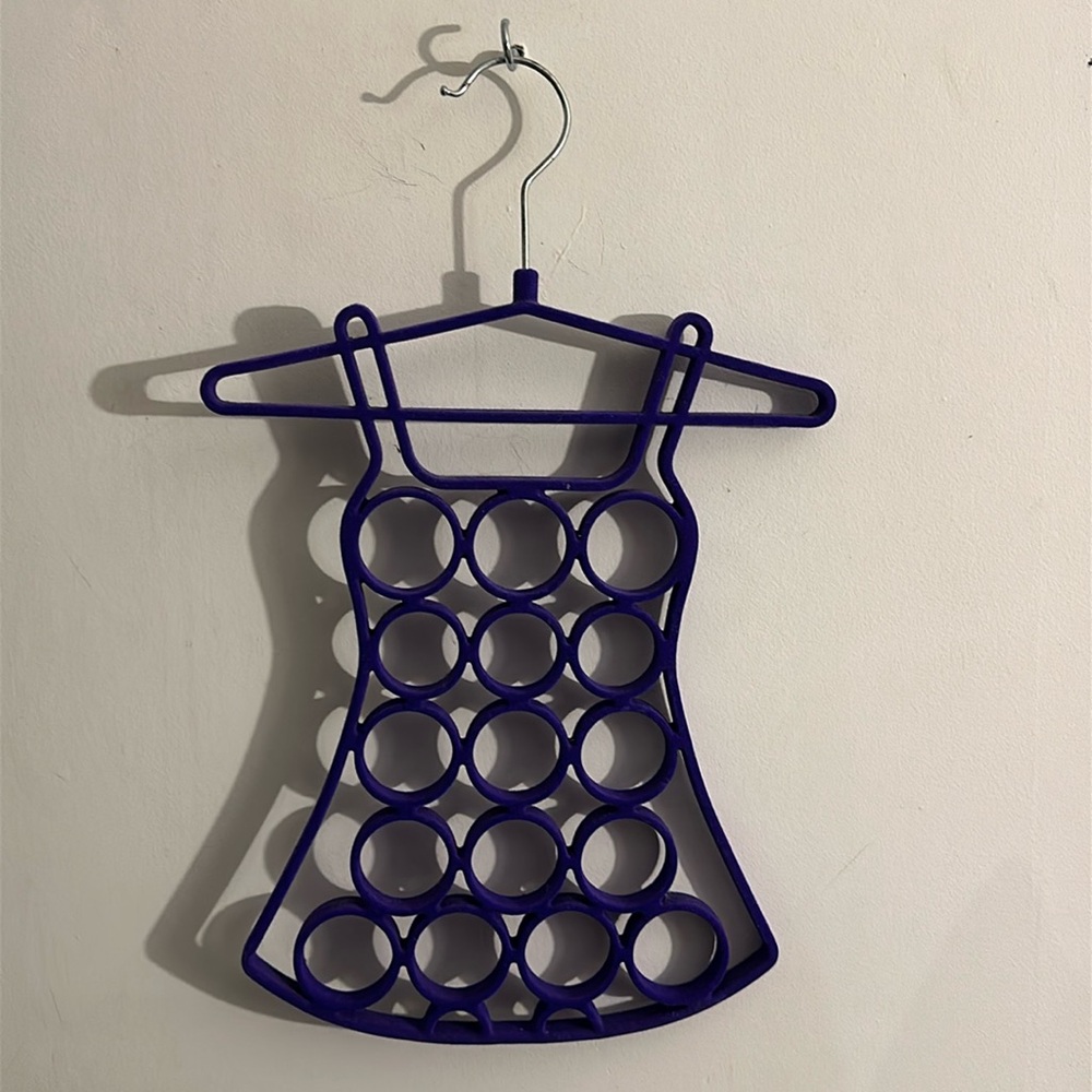 Scarf hanger. Purple fabric covered scarf holder with hanger & sixteen 16 holes